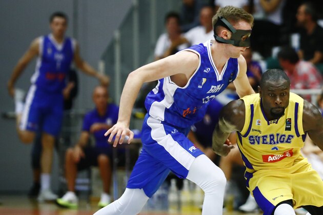 Bosnia's Dzanan Musa, left, chases Sweden's Thomas Massamba during the FIBA basketball World Cup 2019 European pre-qualifying match between Sweden and Bosnia-Herzegovina at Stadium Arena in Norrkoping, Sweden, Wednesday, Aug. 02, 2017. (Stefan Jerrevang/TT News Agency via AP)