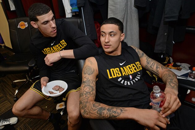 LOS ANGELES, CA - FEBRUARY 23: Lonzo Ball #2 and Kyle Kuzma #0 of the Los Angeles Lakers talk while they get ready in the locker room before the game against the Dallas Mavericks on February 23, 2017 at STAPLES Center in Los Angeles, California. NOTE TO USER: User expressly acknowledges and agrees that, by downloading and/or using this Photograph, user is consenting to the terms and conditions of the Getty Images License Agreement. Mandatory Copyright Notice: Copyright 2017 NBAE (Photo by Andrew D. Bernstein/NBAE via Getty Images)
