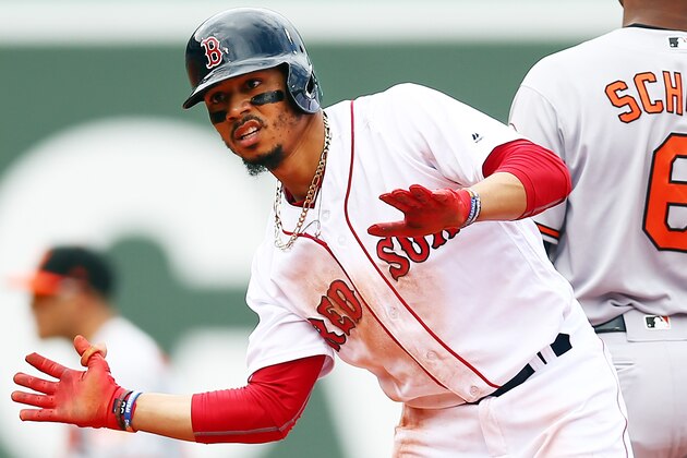 BOSTON, MA - MAY 20:  Mookie Betts #50 of the Boston Red Sox reacts after hitting a double in the third inning of a game against the Baltimore Orioles at Fenway Park on May 20, 2018 in Boston, Massachusetts.  (Photo by Adam Glanzman/Getty Images)