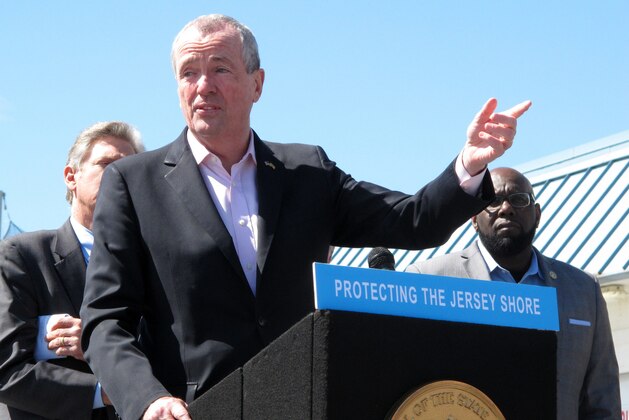 New Jersey Gov. Phil Murphy speaks at a press conference on the boardwalk in Point Pleasant Beach, N.J. on Friday April 20, 2018, before signing a bill banning offshore oil and gas drilling in New Jersey's state waters, as well as prohibiting infrastructure to support drilling in more distant federal waters. New Jersey is one of numerous coastal states using state bans to try to thwart President Trump's plan to open most of America's coastline up to drilling. (AP Photo/Wayne Parry)