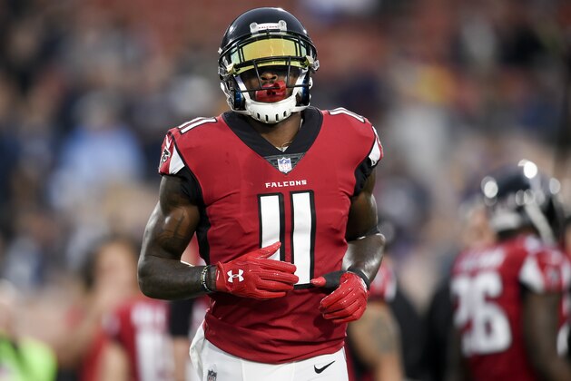 Atlanta Falcons wide receiver Julio Jones warms up before an NFL football wild-card playoff game against the Los Angeles Rams Saturday, Jan. 6, 2018, in Los Angeles. (AP Photo/Kelvin Kuo)