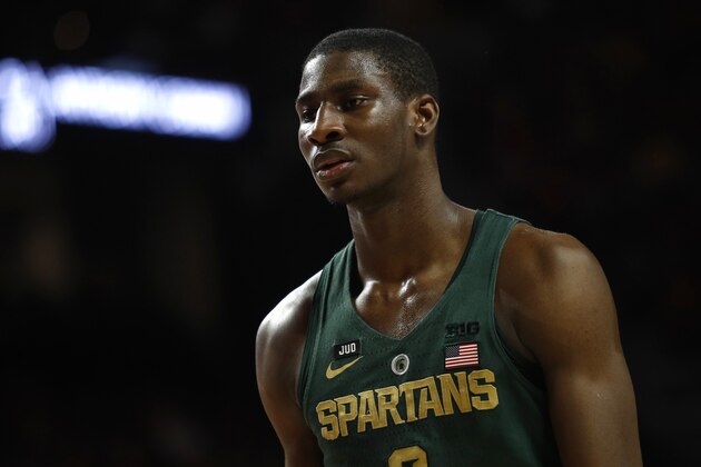 Michigan State forward Jaren Jackson Jr. walks on the court in the first half of an NCAA college basketball game against Maryland in College Park, Md., Sunday, Jan. 28, 2018. (AP Photo/Patrick Semansky)