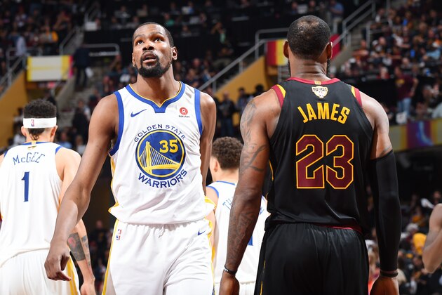 CLEVELAND, OH - JUNE 8: LeBron James #23 of the Cleveland Cavaliers and Kevin Durant #35 of the Golden State Warriors looks on during Game Four of the 2018 NBA Finals on June 8, 2018 at Quicken Loans Arena in Cleveland, Ohio. NOTE TO USER: User expressly acknowledges and agrees that, by downloading and or using this Photograph, user is consenting to the terms and conditions of the Getty Images License Agreement. Mandatory Copyright Notice: Copyright 2018 NBAE (Photo by Andrew D. Bernstein/NBAE via Getty Images)