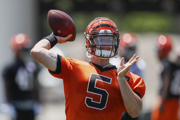 Cincinnati Bengals quarterback Logan Woodside runs a throwing drill during practice at the NFL football team's training camp, Tuesday, May 29, 2018, in Cincinnati. (AP Photo/John Minchillo)
