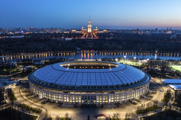 This photo taken on Monday, April 23, 2018, shows an aerial view of the World Cup Luzhniki stadium with the Moscow River and the State University in the background in Moscow, Russia. The Luzhniki stadium will hold the 2018 World Cup final. (AP Photo/Dmitry Serebryakov)