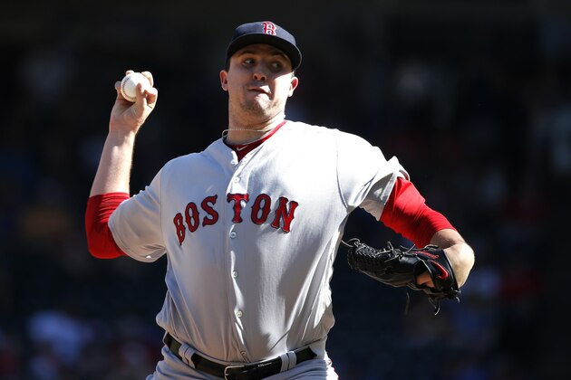 ARLINGTON, TX - MAY 6: Carson Smith #39 of the Boston Red Sox throws against the Texas Rangers during the ninth inning at Globe Life Park in Arlington on May 6, 2018 in Arlington, Texas. The Red Sox won 6-1. (Photo by Ron Jenkins/Getty Images)
