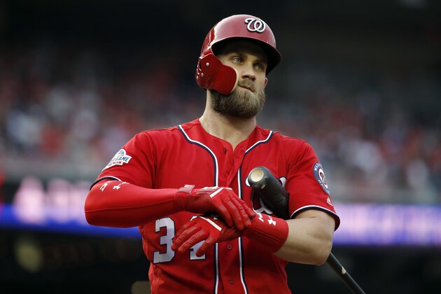 Washington Nationals right fielder Bryce Harper (34) pauses while batting during the first inning of a baseball game against the San Francisco Giants at Nationals Park, Friday, June 8, 2018, in Washington. (AP Photo/Alex Brandon)