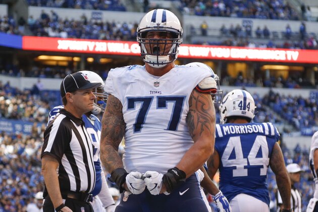 INDIANAPOLIS, IN - NOVEMBER 26:  Taylor Lewan #77 of the Tennessee Titans celebrates after a touchdown against the Indianapolis Colts at Lucas Oil Stadium on November 26, 2017 in Indianapolis, Indiana.  (Photo by Michael Reaves/Getty Images)