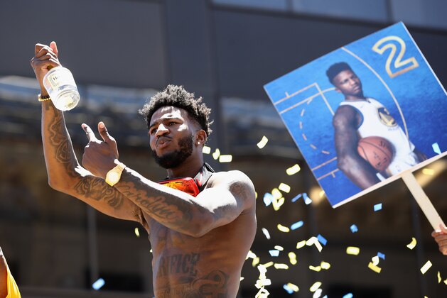 OAKLAND, CA - JUNE 12:  Jordan Bell #2 of the Golden State Warriors rides on a bus during the Golden State Warriors Victory Parade on June 12, 2018 in Oakland, California.  The Golden State Warriors beat the Cleveland Cavaliers 4-0 to win the 2018 NBA Finals. NOTE TO USER: User expressly acknowledges and agrees that, by downloading and or using this photograph, User is consenting to the terms and conditions of the Getty Images License Agreement.  (Photo by Ezra Shaw/Getty Images)
