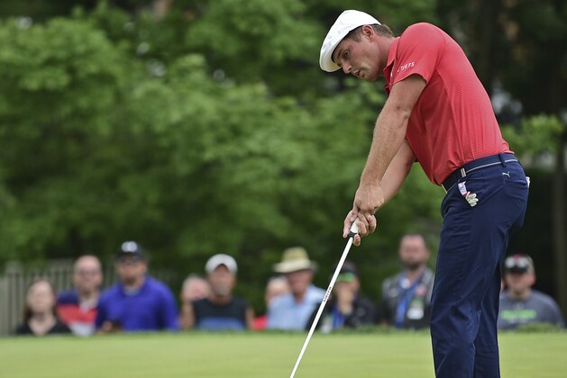 Bryson DeChambeau follows his putt on the seventh hole during the final round of the Memorial golf tournament Sunday, June 3, 2018, in Dublin, Ohio. (AP Photo/David Dermer)