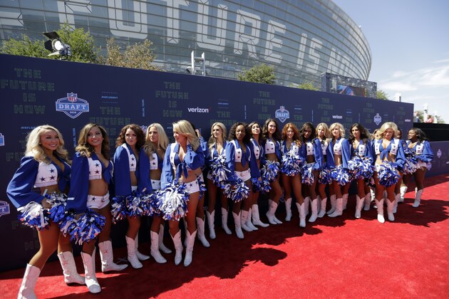 The Dallas Cowboys Cheerleaders stand on the red carpet before the first round of the 2018 NFL football draft, Thursday, April 26, 2018, in Arlington, Texas. (AP Photo/Eric Gay)
