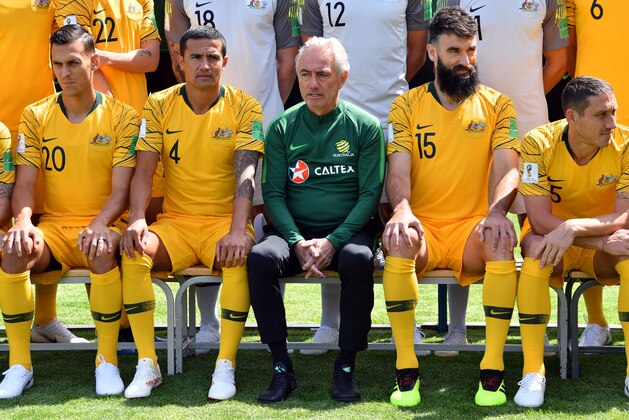 (L to R) Australia's defender Trent Sainsbury, forward Tim Cahill, coach Bert van Marwijk, midfielder Mile Jedinak and midfielder Mark Milligan pose on the sideline of a training session in Kazan on June 12, 2018, ahead of the Russia 2018 World Cup football tournament. (Photo by SAEED KHAN / AFP)        (Photo credit should read SAEED KHAN/AFP/Getty Images)