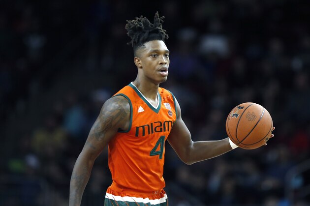 Miami's Lonnie Walker IV plays against Boston College during the second half of an NCAA college basketball game in Boston, Saturday, Feb. 10, 2018. Boston College won 72-70. (AP Photo/Michael Dwyer)