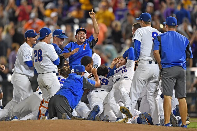 OMAHA, NE - JUNE 27:  Players of the Florida Gators celebrate after defeating the LSU Tigers 6-1 to win the National Championship at the College World Series on June 27, 2017 at TD Ameritrade Park in Omaha, Nebraska.  (Photo by Peter Aiken/Getty Images)