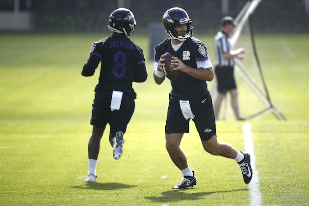 Baltimore Ravens quarterback Joe Flacco, right, runs a drill past quarterback Lamar Jackson during an NFL football practice at the team's headquarters in Owings Mills, Md., Tuesday, June 12, 2018. (AP Photo/Patrick Semansky) Baltimore Ravens quarterback Joe Flacco, right, runs a drill past quarterback Lamar Jackson during an NFL football practice at the team's headquarters in Owings Mills, Md., Tuesday, June 12, 2018. (AP Photo/Patrick Semansky)