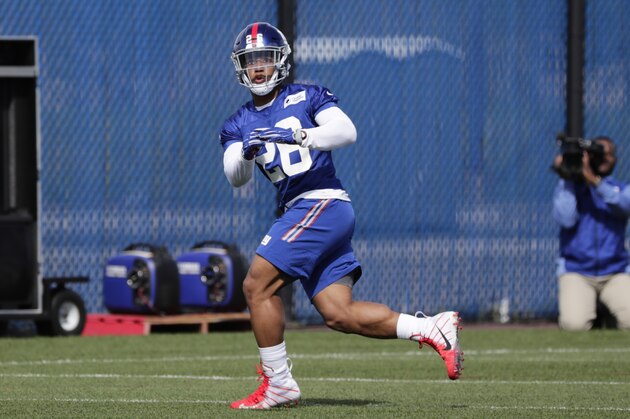 New York Giants running back Saquon Barkley catches a pass during NFL football rookie minicamp Friday, May 11, 2018, in East Rutherford, N.J. (AP Photo/Frank Franklin II)