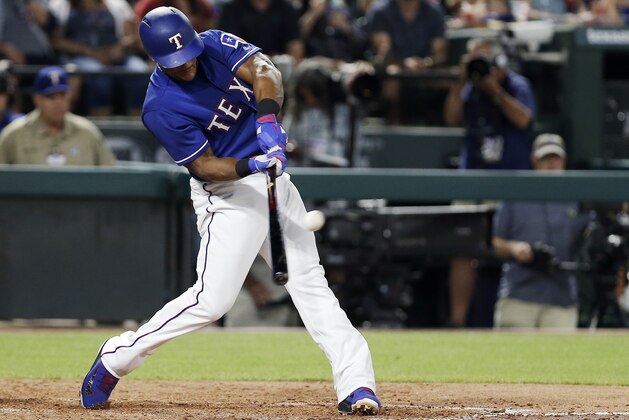 Texas Rangers' Adrian Beltre (29) makes contact for an RBI single during the sixth inning of a baseball game against the Detroit Tigers, Tuesday, May 8, 2018, in Arlington, Texas. (AP Photo/Brandon Wade)
