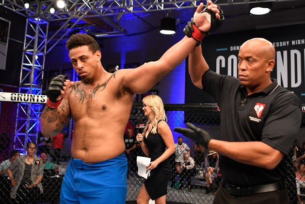 LAS VEGAS, NV - JUNE 12:  Greg Hardy celebrates after knocking out Austen Lane in their heavyweight bout during Dana White's Tuesday Night Contender Series at the TUF Gym on June 12, 2018 in Las Vegas, Nevada. (Photo by Jeff Bottari/DWTNCS LLC)