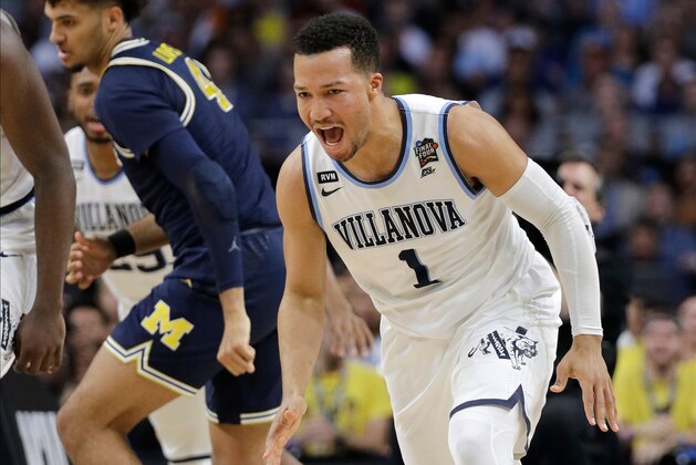 Villanova's Jalen Brunson (1) reacts after shooting a basket during the first half in the championship game of the Final Four NCAA college basketball tournament against Michigan, Monday, April 2, 2018, in San Antonio. (AP Photo/David J. Phillip)