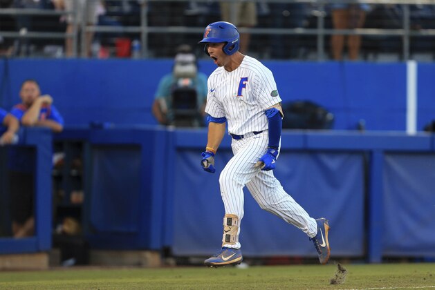 Florida's Jonathan India celebrates after hitting a home run against Auburn during the first inning of an NCAA Super Regional college baseball game Monday, June 11, 2018, in Gainesville, Fla. (AP Photo/Matt Stamey) Florida's Jonathan India celebrates after hitting a home run against Auburn during the first inning of an NCAA Super Regional college baseball game Monday, June 11, 2018, in Gainesville, Fla. (AP Photo/Matt Stamey)