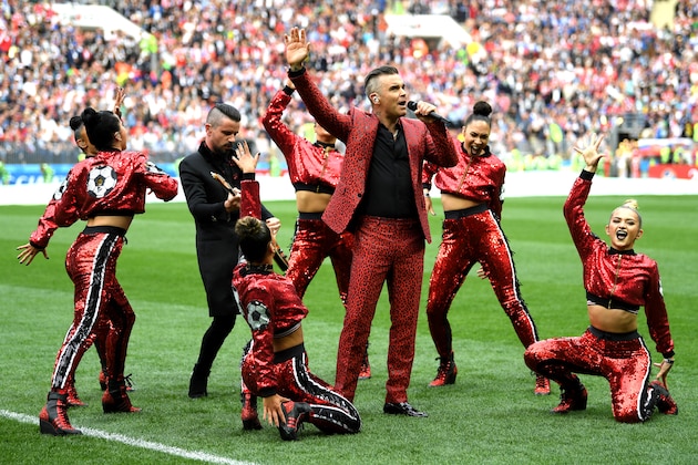 MOSCOW, RUSSIA - JUNE 14:  British popstar Robbie Williams performs during the opening ceremony prior to the 2018 FIFA World Cup Russia Group A match between Russia and Saudi Arabia at Luzhniki Stadium on June 14, 2018 in Moscow, Russia.  (Photo by Matthias Hangst/Getty Images)