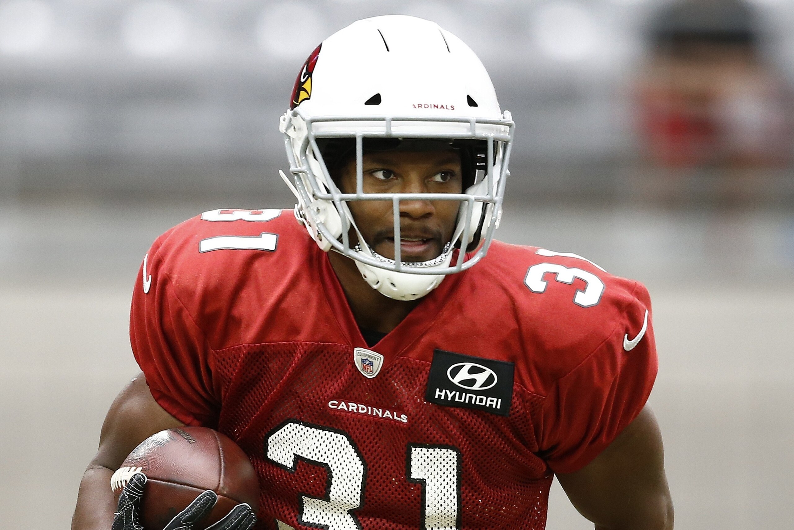 Arizona Cardinals running back David Johnson runs with the football during an NFL football training camp Thursday, Aug. 17, 2017, in Glendale, Ariz. (AP Photo/Ross D. Franklin)
