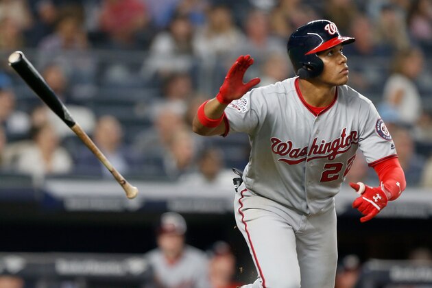 NEW YORK, NY - JUNE 13:  Juan Soto #22 of the Washington Nationals follows through on his seventh inning home run against the New York Yankees at Yankee Stadium on June 13, 2018 in the Bronx borough of New York City. The Nationals defeated the Yankees 5-4.  (Photo by Jim McIsaac/Getty Images)