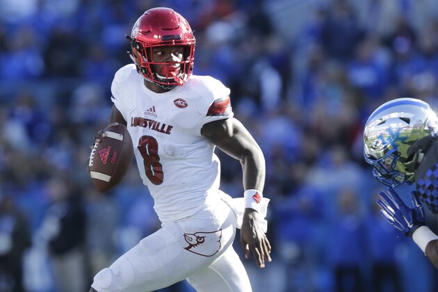 Louisville quarterback Lamar Jackson runs the ball during the second half of an NCAA college football game against Kentucky Saturday, Nov. 25, 2017, in Lexington, Ky. Louisville won the game 44-17. (AP Photo/David Stephenson)