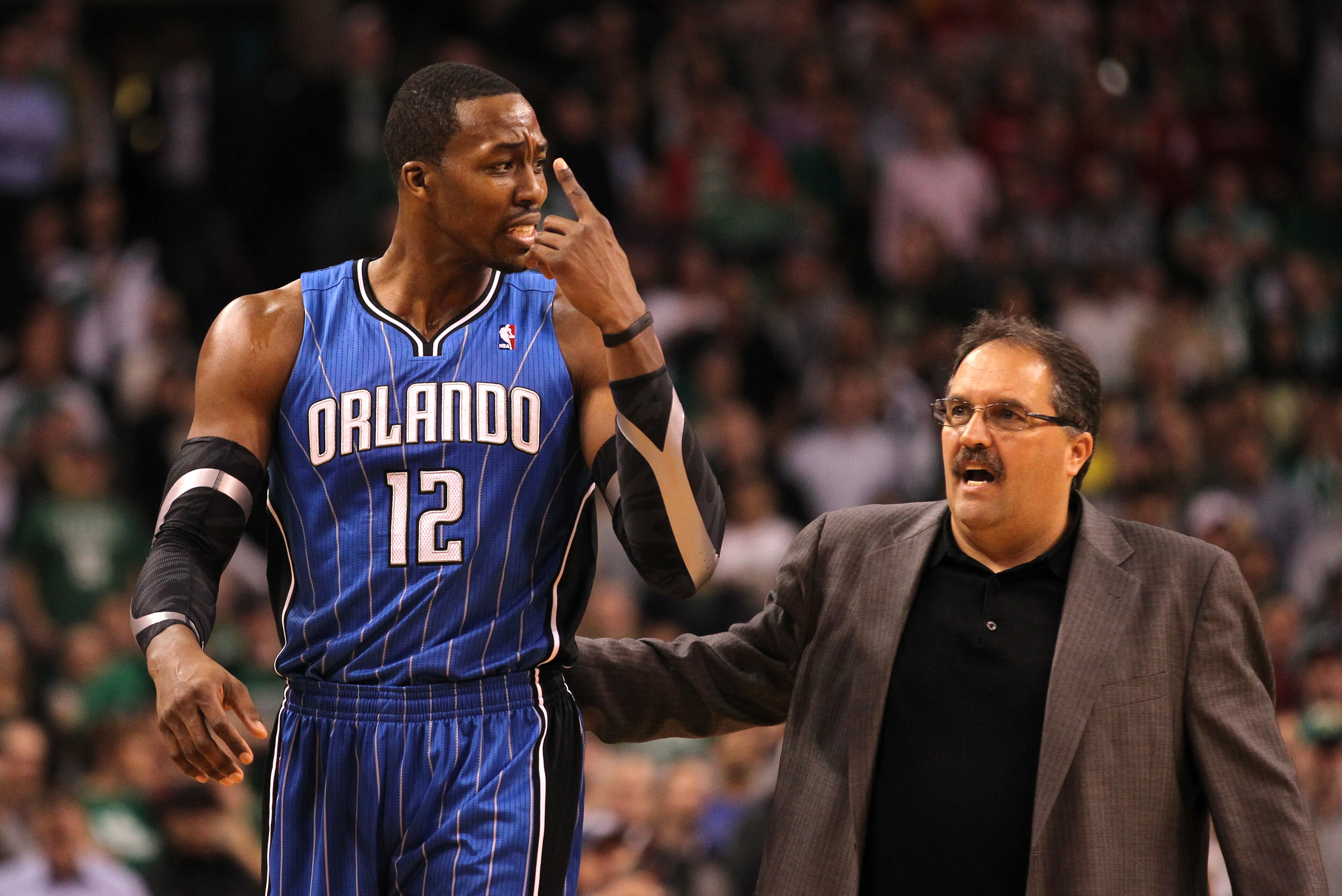 BOSTON, MA - JANUARY 23: Head Coach Stan Van Gundy talks to Dwight Howard #12 of the Orlando Magic during the game against the Boston Celtics on January 23, 2012 at the TD Garden in Boston, Massachusetts. NOTE TO USER: User expressly acknowledges and agrees that, by downloading and or using this photograph, User is consenting to the terms and conditions of the Getty Images License Agreement. Mandatory Copyright Notice: Copyright 2012 NBAE (Photo by Jim Rogash/NBAE via Getty Images) BOSTON, MA - JANUARY 23: Head Coach Stan Van Gundy talks to Dwight Howard #12 of the Orlando Magic during the game against the Boston Celtics on January 23, 2012 at the TD Garden in Boston, Massachusetts. NOTE TO USER: User expressly acknowledges and agrees that, by downloading and or using this photograph, User is consenting to the terms and conditions of the Getty Images License Agreement. Mandatory Copyright Notice: Copyright 2012 NBAE (Photo by Jim Rogash/NBAE via Getty Images)