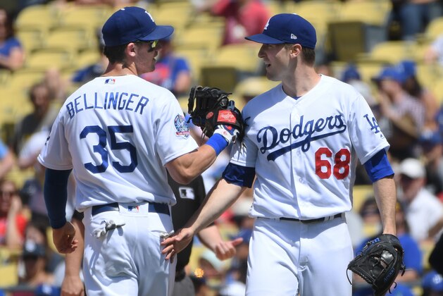 LOS ANGELES, CA - JUNE 10: Cody Bellinger #35 and Ross Stripling #68 of the Los Angeles Dodgers celebrate getting an out in the sixth inning against the Atlanta Braves at Dodger Stadium on June 10, 2018 in Los Angeles, California.  Dodgers won 7-2. (Photo by John McCoy/Getty Images)