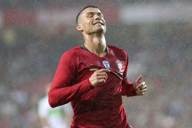 Portugal's Cristiano Ronaldo gestures during a friendly soccer match between Portugal and Algeria in Lisbon, Portugal, Thursday, June 7, 2018. (AP Photo/Armando Franca)