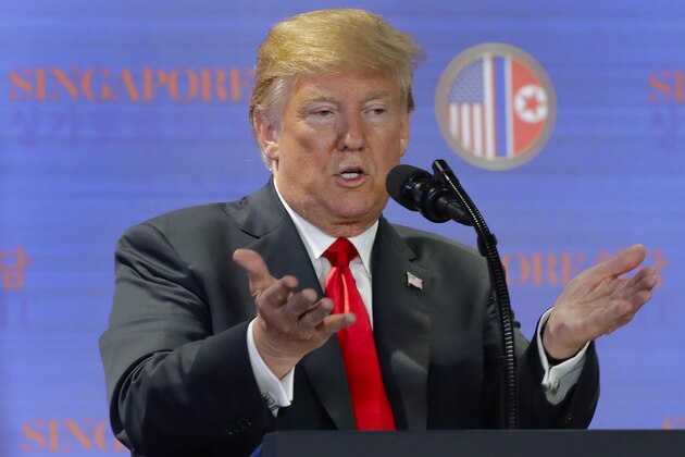 U.S. President Donald Trump answers questions about the summit with North Korea leader Kim Jong Un during a press conference at the Capella resort on Sentosa Island Tuesday, June 12, 2018 in Singapore. (AP Photo/Wong Maye-E)