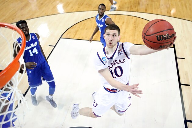 WICHITA, KS - MARCH 17:  Sviatoslav Mykhailiuk #10 of the Kansas Jayhawks drives to the basket against the Seton Hall Pirates during the second round of the 2018 NCAA Men's Basketball Tournament at INTRUST Arena on March 17, 2018 in Wichita, Kansas.  (Photo by Jeff Gross/Getty Images)