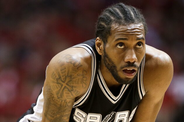 San Antonio Spurs forward Kawhi Leonard looks on during the second half in Game 3 of an NBA basketball second-round playoff series against the Houston Rockets, Friday, May 5, 2017, in Houston. San Antonio won the game 103-92. (AP Photo/Eric Christian Smith)