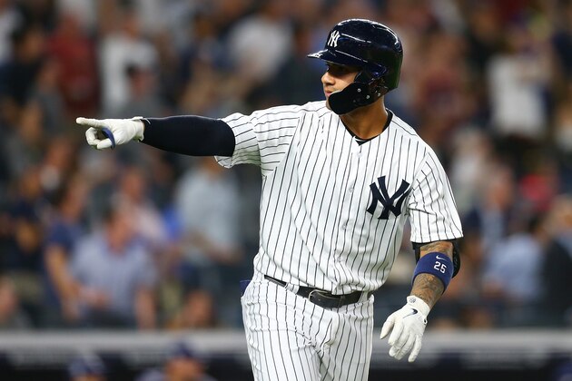 NEW YORK, NY - JUNE 14:  Gleyber Torres #25 of the New York Yankees points to the dugout after hitting a 3-run home run in the fifth inning against the Tampa Bay Rays at Yankee Stadium on June 14, 2018 in the Bronx borough of New York City.  (Photo by Mike Stobe/Getty Images)