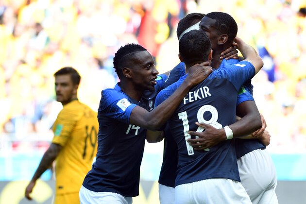 France's midfielder Paul Pogba (R) celebrates with France's midfielder Blaise Matuidi (L) and France's midfielder Nabil Fekir after scoring their second goal during the Russia 2018 World Cup Group C football match between France and Australia at the Kazan Arena in Kazan on June 16, 2018. (Photo by SAEED KHAN / AFP) / RESTRICTED TO EDITORIAL USE - NO MOBILE PUSH ALERTS/DOWNLOADS        (Photo credit should read SAEED KHAN/AFP/Getty Images)