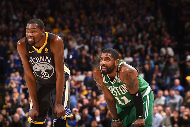 OAKLAND, CA - JANUARY 27: Kevin Durant #35 of the Golden State Warriors and Kyrie Irving #11 of the Boston Celtics during the game on January 27, 2018 at ORACLE Arena in Oakland, California. NOTE TO USER: User expressly acknowledges and agrees that, by downloading and/or using this photograph, user is consenting to the terms and conditions of Getty Images License Agreement. Mandatory Copyright Notice: Copyright 2018 NBAE (Photo by Noah Graham/NBAE via Getty Images)