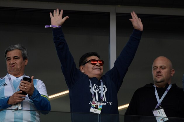 TOPSHOT - Argentina's football legend Diego Maradona waves to the crowd ahead of the Russia 2018 World Cup Group D football match between Argentina and Iceland at the Spartak Stadium in Moscow on June 16, 2018. (Photo by Juan Mabromata / AFP) / RESTRICTED TO EDITORIAL USE - NO MOBILE PUSH ALERTS/DOWNLOADS        (Photo credit should read JUAN MABROMATA/AFP/Getty Images)