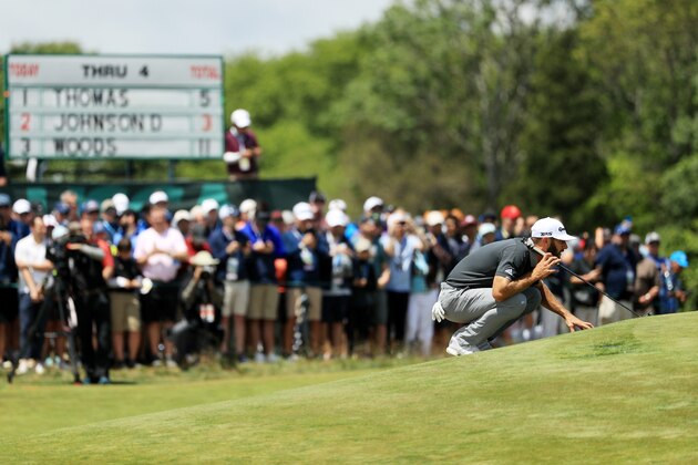 SOUTHAMPTON, NY - JUNE 15: Dustin Johnson of the United States lines up a putt on the fifth green during the second round of the 2018 U.S. Open at Shinnecock Hills Golf Club on June 15, 2018 in Southampton, New York.  (Photo by Mike Ehrmann/Getty Images)