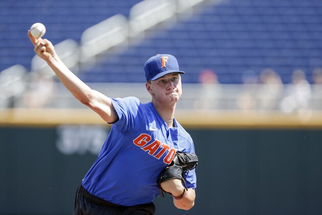 Florida pitcher Brady Singer throws during practice at TD Ameritrade Park in Omaha, Neb., Friday, June 15, 2018. Florida plays Texas Tech on Sunday in the NCAA College World Series baseball tournament.. (AP Photo/Nati Harnik)