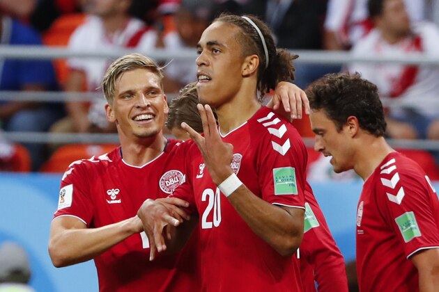 Denmark's forward Yussuf Poulsen (C) celebrates with teammates after scoring a goal during the Russia 2018 World Cup Group C football match between Peru and Denmark at the Mordovia Arena in Saransk on June 16, 2018. (Photo by Jack GUEZ / AFP) / RESTRICTED TO EDITORIAL USE - NO MOBILE PUSH ALERTS/DOWNLOADS        (Photo credit should read JACK GUEZ/AFP/Getty Images)