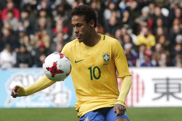 FILE - In this Friday, Nov. 10, 2017 filer, Brazil's Neymar controls the ball during the international friendly soccer match between Brazil and Japan at the Pierre Mauroy stadium in Lille, northern France. (AP Photo/Michel Spingler, File)