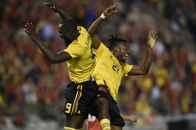 TOPSHOT - Belgium's forward Michy Batshuayi (R) celebrates with Belgium's forward Romelu Lukaku (L) after scoring a goal during the international friendly football match between Belgium and Costa Rica at the King Baudouin Stadium in Brussels on June 11, 2018. (Photo by JOHN THYS / AFP)        (Photo credit should read JOHN THYS/AFP/Getty Images)