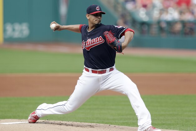 Cleveland Indians starting pitcher Carlos Carrasco delivers in the first inning of a baseball game against the Minnesota Twins, Saturday, June 16, 2018, in Cleveland. (AP Photo/Tony Dejak)