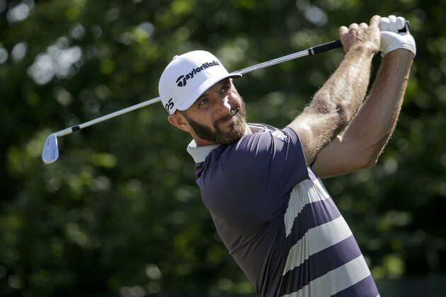 Dustin Johnson plays his shot from the second tee during the third round of the U.S. Open Golf Championship, Saturday, June 16, 2018, in Southampton, N.Y. (AP Photo/Seth Wenig)