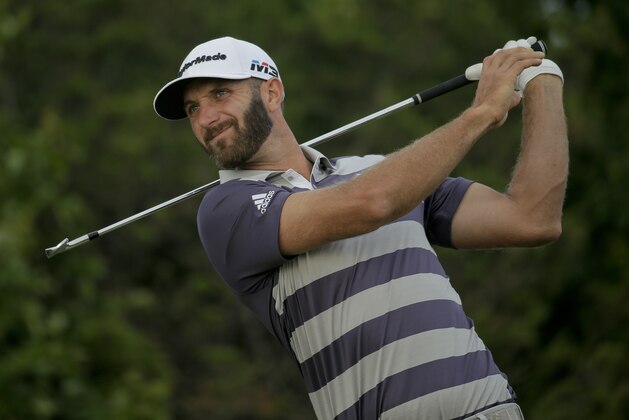 Dustin Johnson plays his shot from the 15th tee during the third round of the U.S. Open Golf Championship, Saturday, June 16, 2018, in Southampton, N.Y. (AP Photo/Seth Wenig)