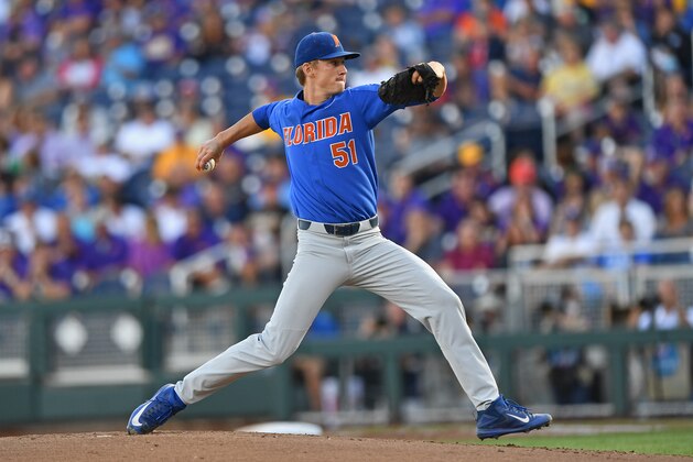 Omaha, NE - JUNE 26:  Pitcher Brady Singer #51 of the Florida Gators delivers a pitch against the LSU Tigers in the first inning during game one of the College World Series Championship Series on June 26, 2017 at TD Ameritrade Park in Omaha, Nebraska.  (Photo by Peter Aiken/Getty Images)
