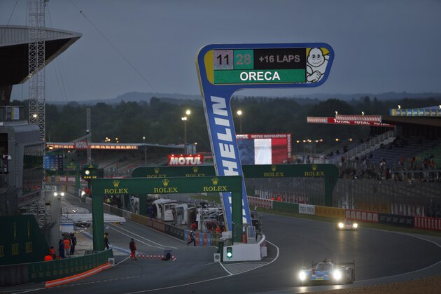 Cars race on the race track, during the 86th 24-hour Le Mans endurance race, in Le Mans, western France, Sunday, June 17, 2018. (AP Photo/Thibault Camus)