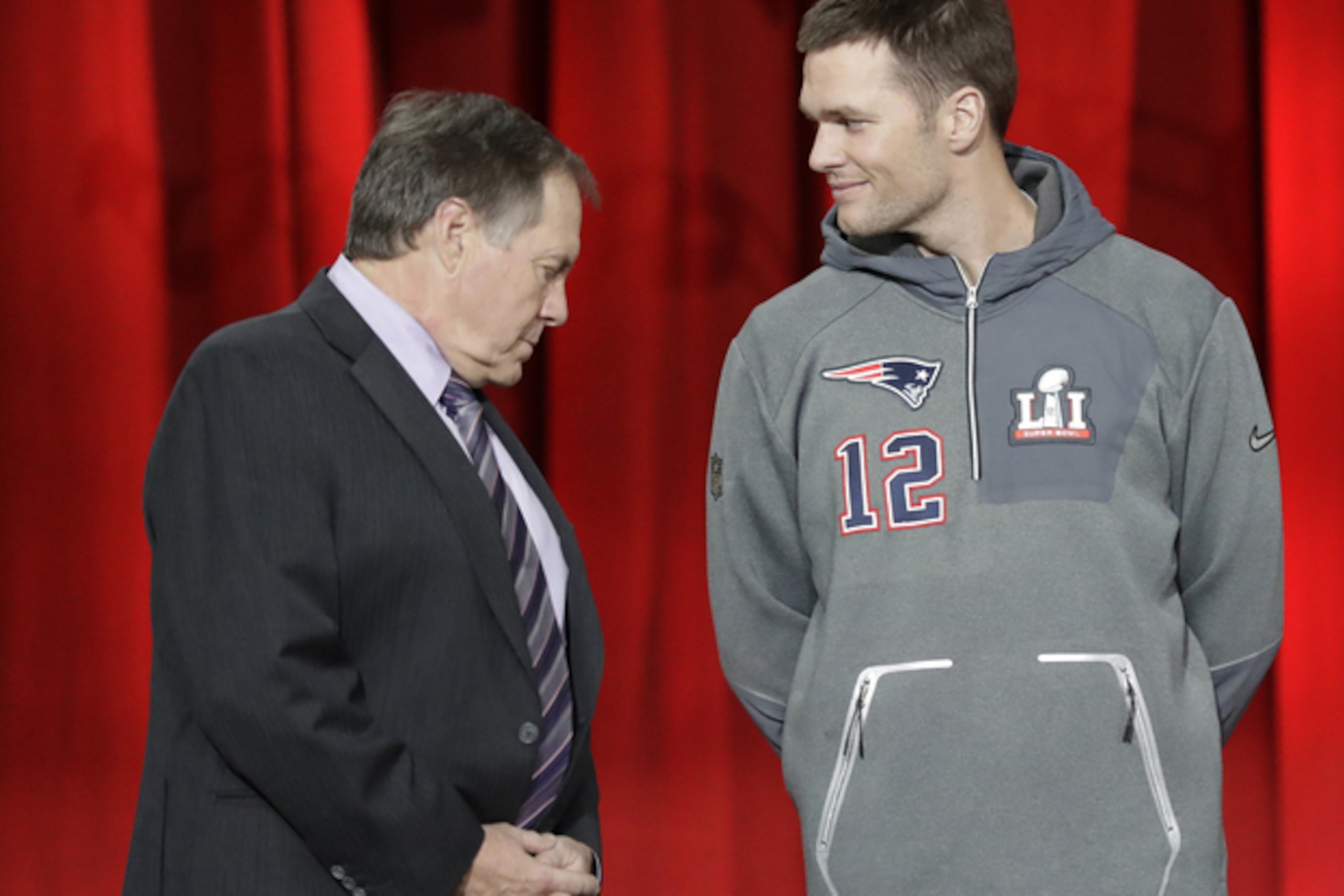 New England Patriots head coach Bill Belichick and Tom Brady are introduced during opening night for the NFL Super Bowl 51 football game at Minute Maid Park Monday, Jan. 30, 2017, in Houston. (AP Photo/David J. Phillip)