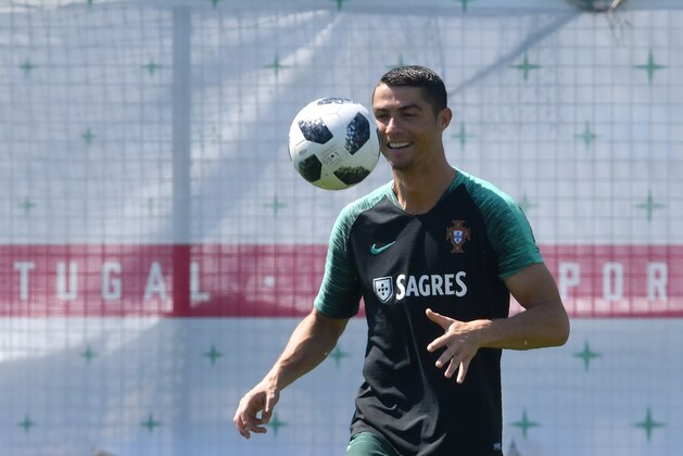 TOPSHOT - Portugal's forward Cristiano Ronaldo attends a training session at the team's base in Kratovo, outside Moscow, on June 17, 2018, during the Russia 2018 World Cup football tournament. (Photo by Francisco LEONG / AFP)        (Photo credit should read FRANCISCO LEONG/AFP/Getty Images)